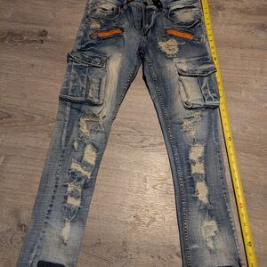 Distressed Blue Jeans with Orange Accents